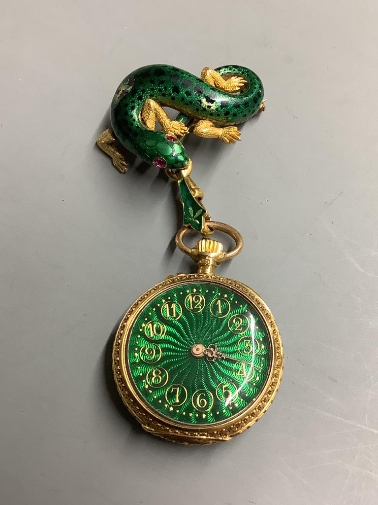 A lady's continental 18k and green enamel fob watch, on a yellow metal, enamel and gem set suspension brooch, modelled as a lizard (enamel a.f.)